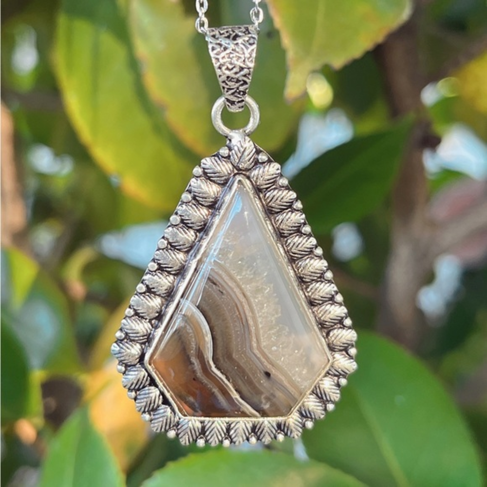 Silver plated triangular banded Botswana agate pendant‎